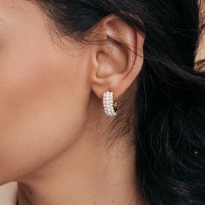 Olive and Piper pearl huggie earrings